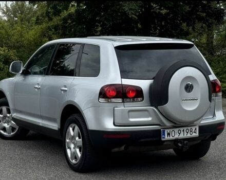 Серый Фольксваген Туарег, объемом двигателя 3 л и пробегом 219 тыс. км за 3700 $, фото 2 на Automoto.ua