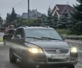 Сірий Фольксваген Туарег, об'ємом двигуна 3 л та пробігом 291 тис. км за 9500 $, фото 4 на Automoto.ua