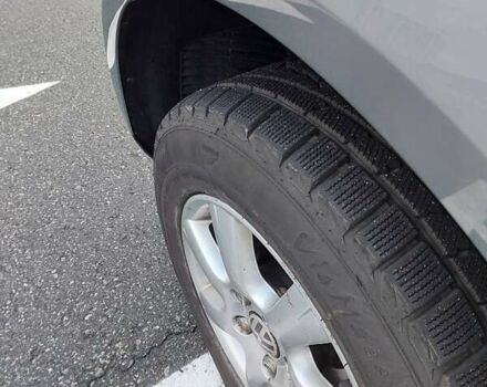 Серый Фольксваген Туарег, объемом двигателя 2.97 л и пробегом 245 тыс. км за 12000 $, фото 4 на Automoto.ua