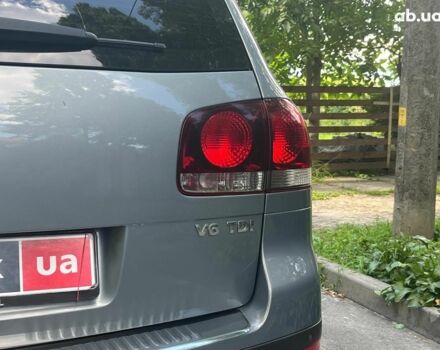 Сірий Фольксваген Туарег, об'ємом двигуна 3 л та пробігом 313 тис. км за 10990 $, фото 8 на Automoto.ua