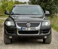 Серый Фольксваген Туарег, объемом двигателя 3 л и пробегом 391 тыс. км за 8115 $, фото 1 на Automoto.ua