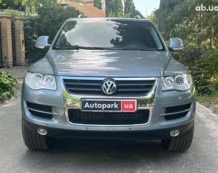 Сірий Фольксваген Туарег, об'ємом двигуна 3 л та пробігом 313 тис. км за 10990 $, фото 2 на Automoto.ua