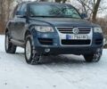 Серый Фольксваген Туарег, объемом двигателя 3 л и пробегом 240 тыс. км за 11500 $, фото 1 на Automoto.ua