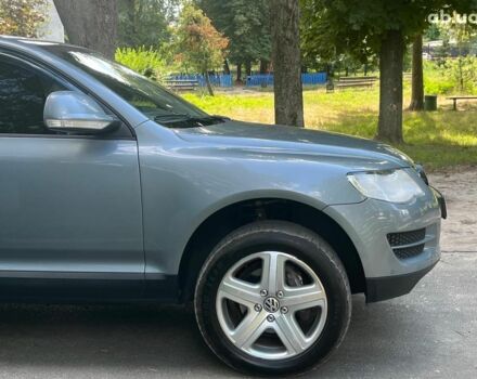 Сірий Фольксваген Туарег, об'ємом двигуна 3 л та пробігом 313 тис. км за 10990 $, фото 4 на Automoto.ua