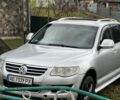 Серый Фольксваген Туарег, объемом двигателя 3 л и пробегом 335 тыс. км за 8500 $, фото 1 на Automoto.ua