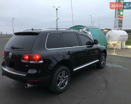 Серый Фольксваген Туарег, объемом двигателя 3.6 л и пробегом 290 тыс. км за 12000 $, фото 17 на Automoto.ua