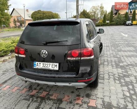 Серый Фольксваген Туарег, объемом двигателя 3 л и пробегом 230 тыс. км за 10500 $, фото 1 на Automoto.ua