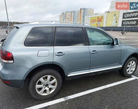 Серый Фольксваген Туарег, объемом двигателя 2.97 л и пробегом 245 тыс. км за 12000 $, фото 1 на Automoto.ua