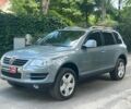 Сірий Фольксваген Туарег, об'ємом двигуна 3 л та пробігом 313 тис. км за 10990 $, фото 1 на Automoto.ua