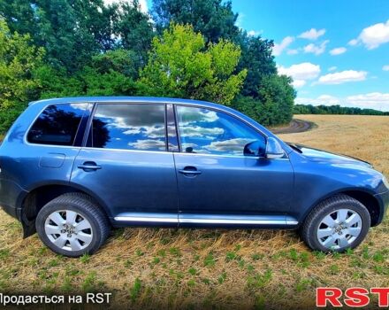 Сірий Фольксваген Туарег, об'ємом двигуна 3 л та пробігом 260 тис. км за 12000 $, фото 2 на Automoto.ua