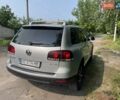 Серый Фольксваген Туарег, объемом двигателя 3 л и пробегом 259 тыс. км за 11500 $, фото 4 на Automoto.ua