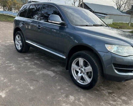 Серый Фольксваген Туарег, объемом двигателя 3 л и пробегом 265 тыс. км за 11500 $, фото 5 на Automoto.ua