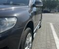 Сірий Фольксваген Туарег, об'ємом двигуна 3 л та пробігом 305 тис. км за 12500 $, фото 4 на Automoto.ua