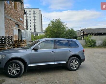 Серый Фольксваген Туарег, объемом двигателя 3 л и пробегом 322 тыс. км за 14500 $, фото 4 на Automoto.ua