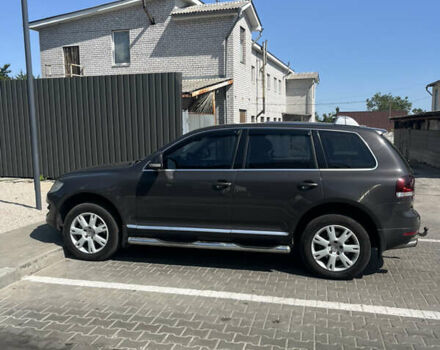 Серый Фольксваген Туарег, объемом двигателя 3 л и пробегом 305 тыс. км за 12500 $, фото 5 на Automoto.ua