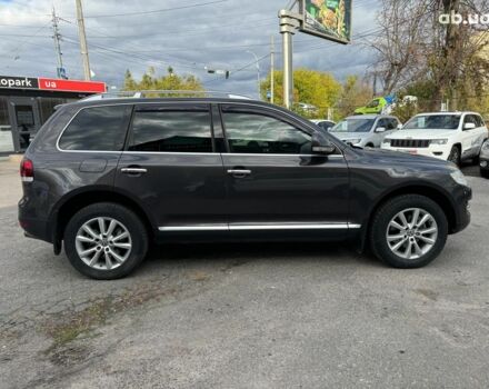 Серый Фольксваген Туарег, объемом двигателя 3 л и пробегом 400 тыс. км за 11890 $, фото 4 на Automoto.ua