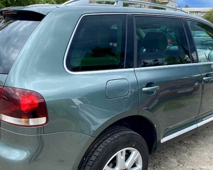 Сірий Фольксваген Туарег, об'ємом двигуна 3 л та пробігом 357 тис. км за 6800 $, фото 4 на Automoto.ua