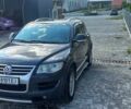 Сірий Фольксваген Туарег, об'ємом двигуна 3 л та пробігом 259 тис. км за 11734 $, фото 3 на Automoto.ua