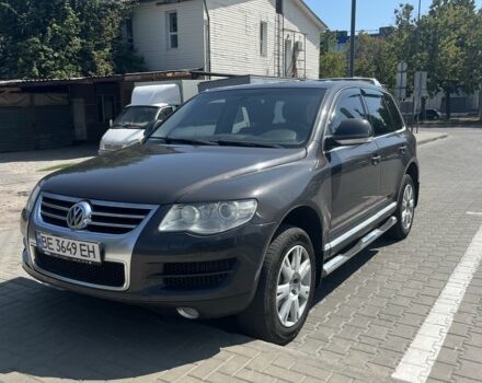 Сірий Фольксваген Туарег, об'ємом двигуна 3 л та пробігом 305 тис. км за 12500 $, фото 1 на Automoto.ua