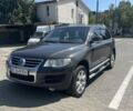 Сірий Фольксваген Туарег, об'ємом двигуна 3 л та пробігом 305 тис. км за 12500 $, фото 1 на Automoto.ua