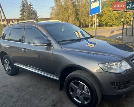 Серый Фольксваген Туарег, объемом двигателя 3 л и пробегом 300 тыс. км за 11000 $, фото 1 на Automoto.ua