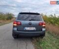 Серый Фольксваген Туарег, объемом двигателя 3 л и пробегом 306 тыс. км за 14800 $, фото 2 на Automoto.ua