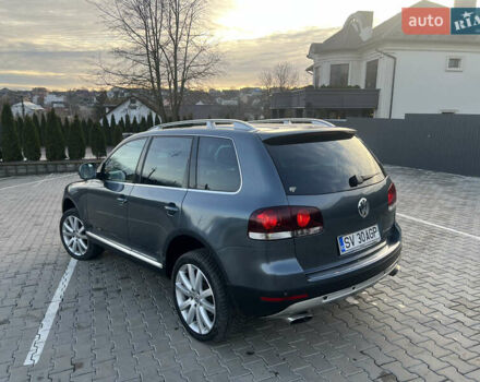 Серый Фольксваген Туарег, объемом двигателя 3 л и пробегом 260 тыс. км за 6599 $, фото 2 на Automoto.ua