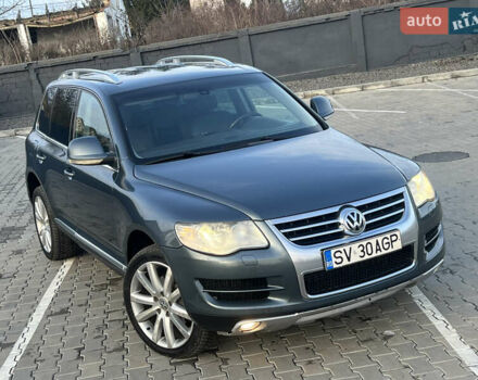 Серый Фольксваген Туарег, объемом двигателя 3 л и пробегом 260 тыс. км за 6599 $, фото 1 на Automoto.ua