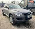 Серый Фольксваген Туарег, объемом двигателя 3 л и пробегом 296 тыс. км за 13550 $, фото 1 на Automoto.ua