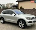 Серый Фольксваген Туарег, объемом двигателя 3 л и пробегом 298 тыс. км за 15500 $, фото 3 на Automoto.ua