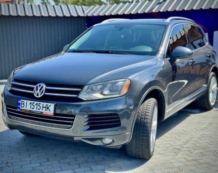 Серый Фольксваген Туарег, объемом двигателя 3 л и пробегом 460 тыс. км за 14300 $, фото 2 на Automoto.ua