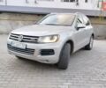 Серый Фольксваген Туарег, объемом двигателя 3 л и пробегом 259 тыс. км за 17000 $, фото 2 на Automoto.ua