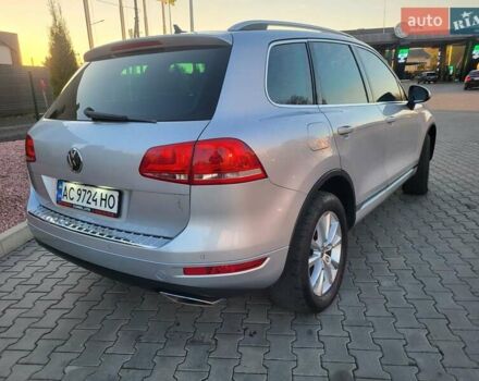 Серый Фольксваген Туарег, объемом двигателя 3 л и пробегом 310 тыс. км за 18500 $, фото 4 на Automoto.ua