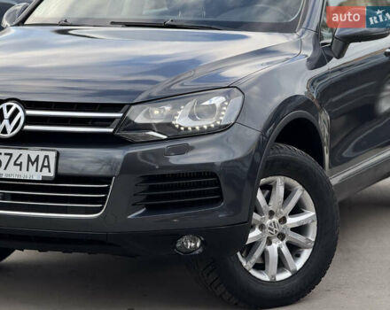 Сірий Фольксваген Туарег, об'ємом двигуна 3 л та пробігом 218 тис. км за 15700 $, фото 1 на Automoto.ua