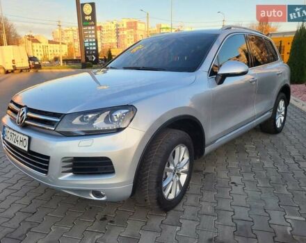Серый Фольксваген Туарег, объемом двигателя 3 л и пробегом 310 тыс. км за 18500 $, фото 1 на Automoto.ua