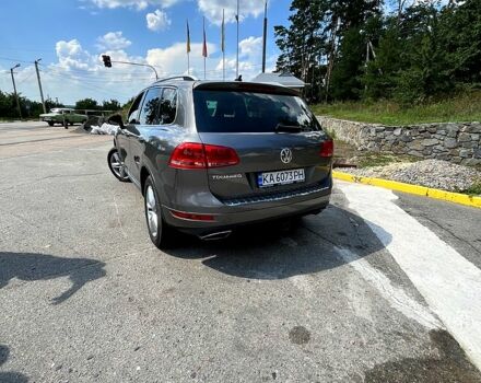 Серый Фольксваген Туарег, объемом двигателя 3 л и пробегом 239 тыс. км за 20000 $, фото 1 на Automoto.ua