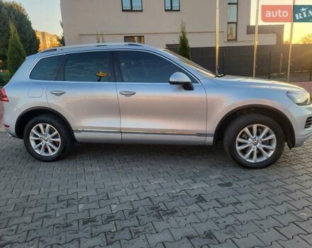Серый Фольксваген Туарег, объемом двигателя 3 л и пробегом 310 тыс. км за 18500 $, фото 3 на Automoto.ua