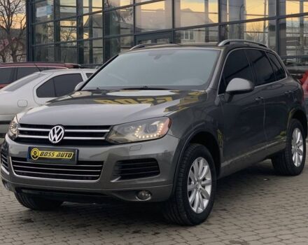 Серый Фольксваген Туарег, объемом двигателя 3 л и пробегом 261 тыс. км за 16500 $, фото 2 на Automoto.ua