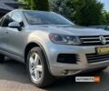 Сірий Фольксваген Туарег, об'ємом двигуна 3 л та пробігом 261 тис. км за 14999 $, фото 1 на Automoto.ua