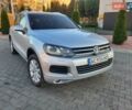 Серый Фольксваген Туарег, объемом двигателя 3 л и пробегом 310 тыс. км за 18500 $, фото 1 на Automoto.ua