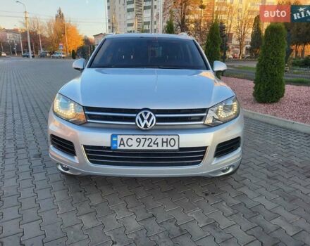 Серый Фольксваген Туарег, объемом двигателя 3 л и пробегом 310 тыс. км за 18500 $, фото 2 на Automoto.ua