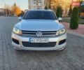 Серый Фольксваген Туарег, объемом двигателя 3 л и пробегом 310 тыс. км за 18500 $, фото 2 на Automoto.ua