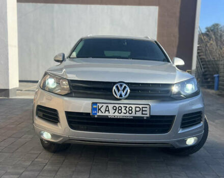 Серый Фольксваген Туарег, объемом двигателя 2.97 л и пробегом 299 тыс. км за 15500 $, фото 2 на Automoto.ua