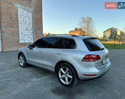 Фольксваген Туарег 2010 в Хмельницком на Automoto.ua Серый Фольксваген Туарег, объемом двигателя 2.97 л и пробегом 317 тыс. км за 15500 $, фото 13 на Automoto.ua