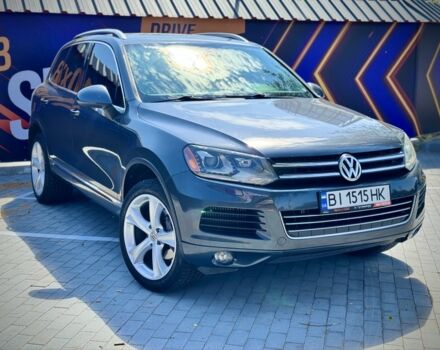 Серый Фольксваген Туарег, объемом двигателя 3 л и пробегом 460 тыс. км за 14300 $, фото 1 на Automoto.ua