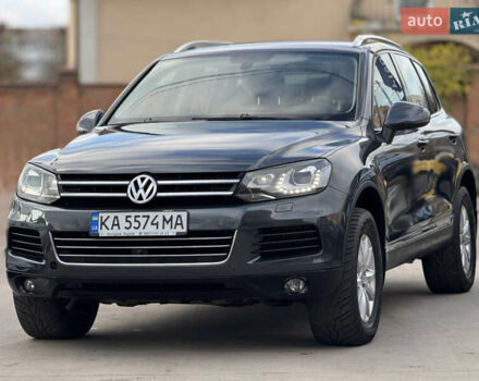 Сірий Фольксваген Туарег, об'ємом двигуна 3 л та пробігом 218 тис. км за 15700 $, фото 4 на Automoto.ua