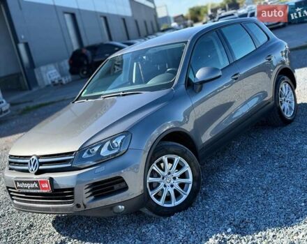 Серый Фольксваген Туарег, объемом двигателя 3 л и пробегом 294 тыс. км за 17890 $, фото 2 на Automoto.ua