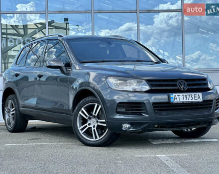 Серый Фольксваген Туарег, объемом двигателя 3 л и пробегом 226 тыс. км за 15490 $, фото 1 на Automoto.ua