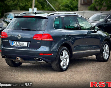 Серый Фольксваген Туарег, объемом двигателя 3 л и пробегом 308 тыс. км за 18500 $, фото 3 на Automoto.ua