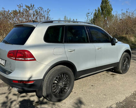 Серый Фольксваген Туарег, объемом двигателя 2.97 л и пробегом 296 тыс. км за 21000 $, фото 2 на Automoto.ua